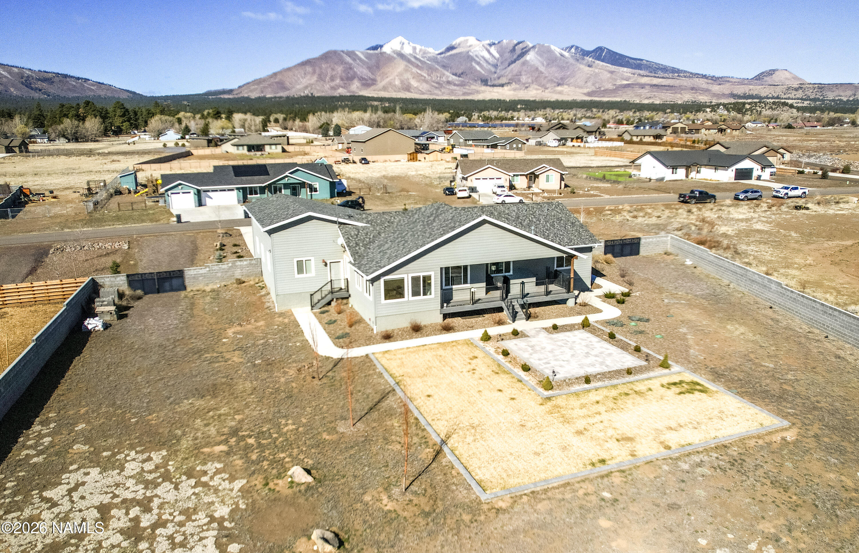 6560 Johnson Ranch Road Flagstaff, AZ 86004 - Photo 46 of 57 an aerial view of residential houses with outdoor space