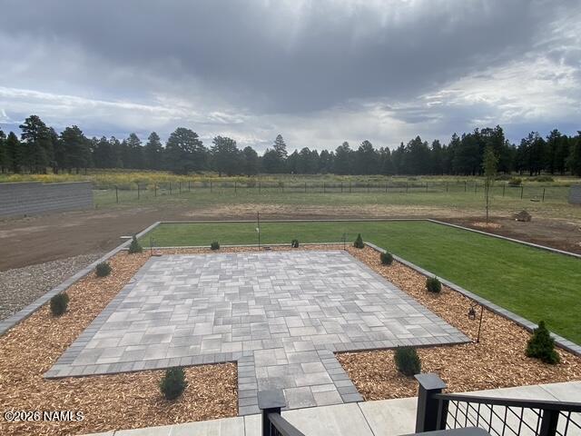 6560 Johnson Ranch Road Flagstaff, AZ 86004 - Photo 52 of 57 a view of a lake from a yard