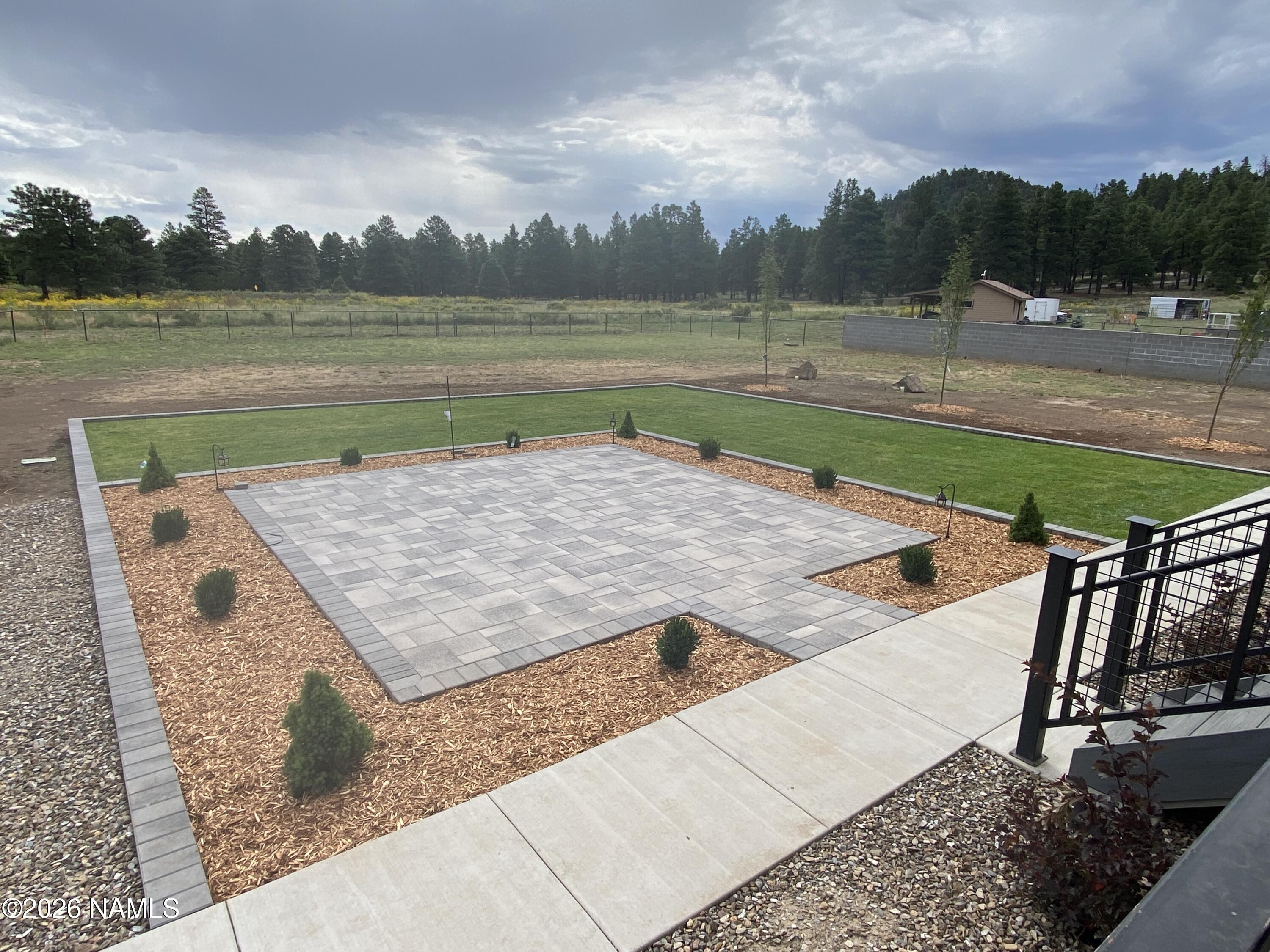 6560 Johnson Ranch Road Flagstaff, AZ 86004 - Photo 53 of 57 Summer Backyard