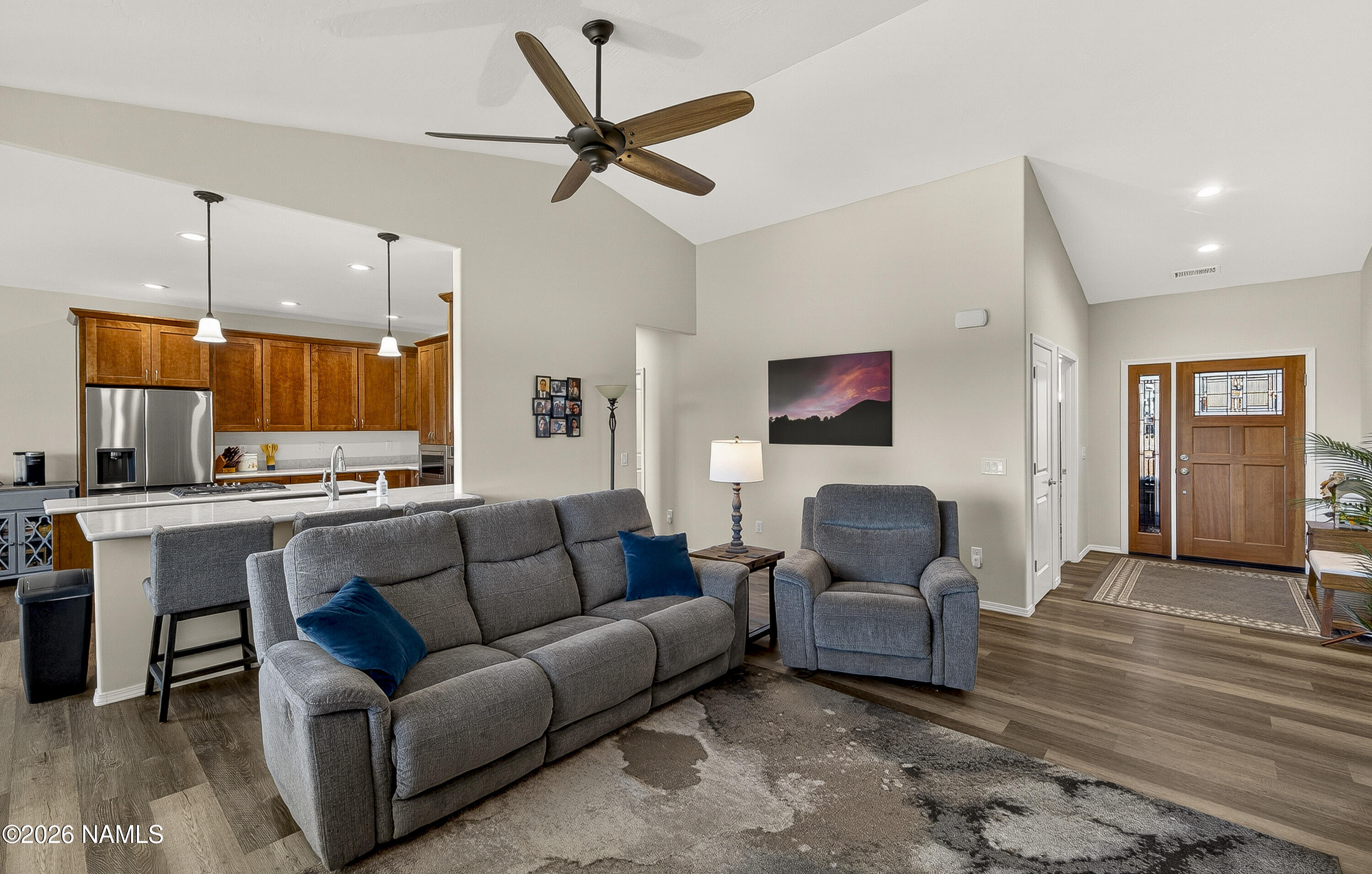 6560 Johnson Ranch Road Flagstaff, AZ 86004 - Photo 9 of 57 a living room with furniture and kitchen view