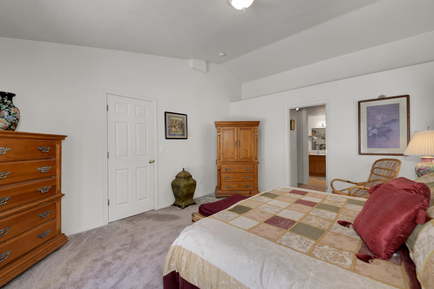 52311 Ammon Road La Pine, OR 97739 - Photo 27 of 39 a bedroom with a bed and wooden floor