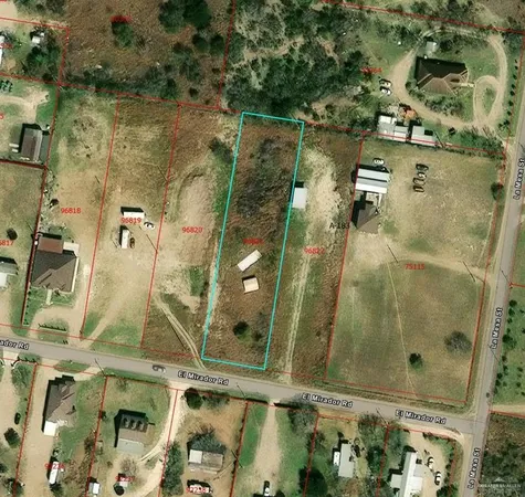 an aerial view of residential house with outdoor space