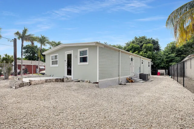a car parked in front of a house
