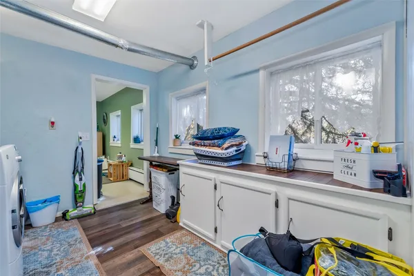 a kitchen with a sink and a stove top oven