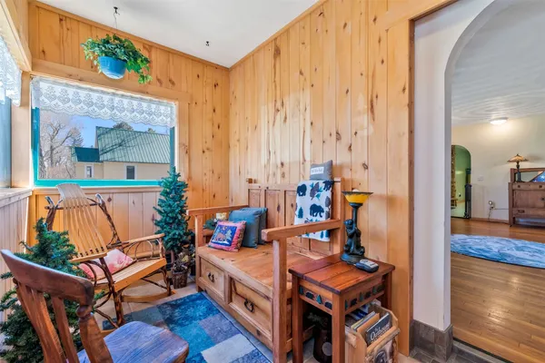 a room with furniture and wooden floor