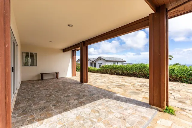 a view of a room with a large window