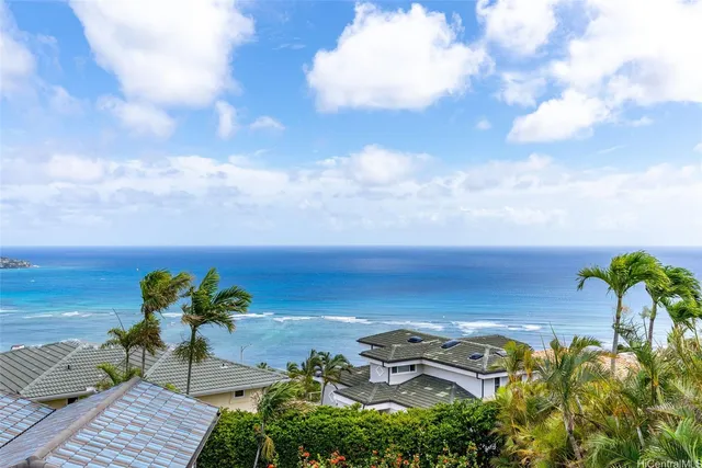 a house with a clock on the door