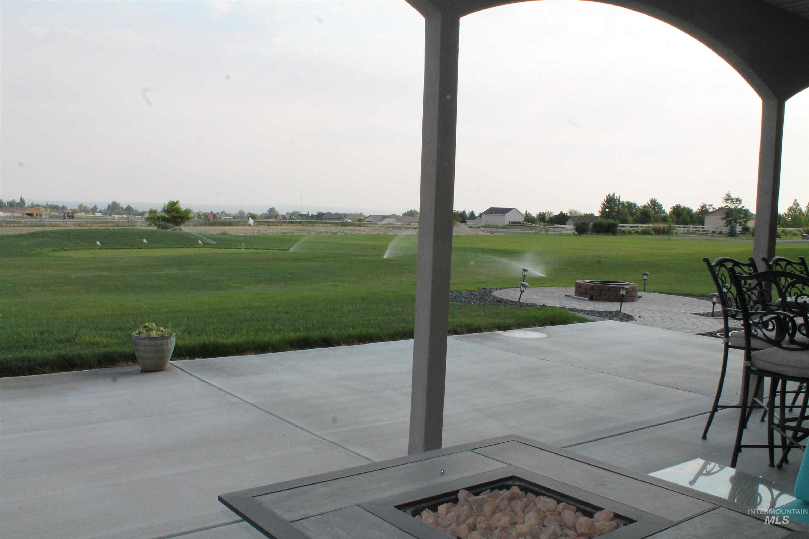 2464 Windmill Drive Twin Falls, ID 83301 - Photo 6 of 47 View of patio with an outdoor fire pit
