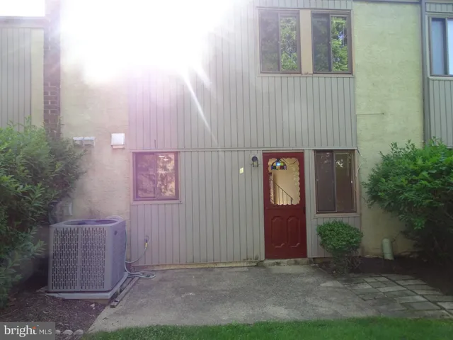 a front view of a house with yard