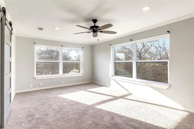 a bathroom with a granite countertop sink a mirror and a shower
