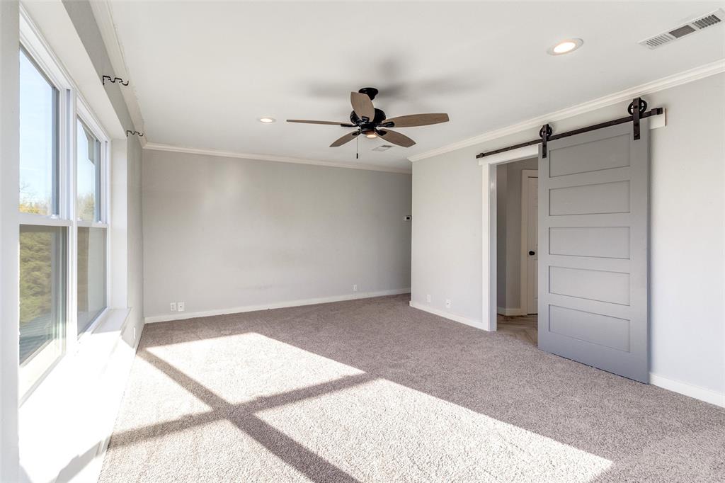 438 Lost Lane Midlothian, TX 76065 - Photo 15 of 33 a view of a livingroom with a ceiling fan and window