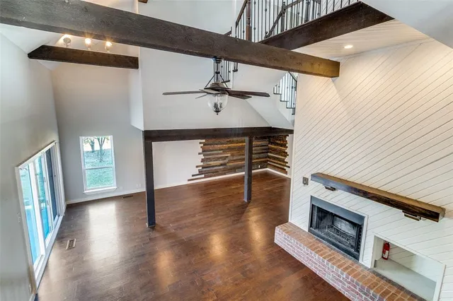 a view of entryway with wooden floor