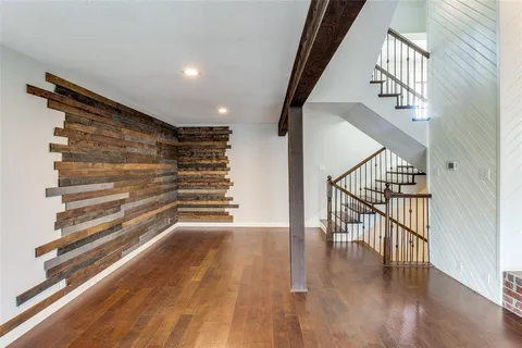 a view of entryway with wooden floor