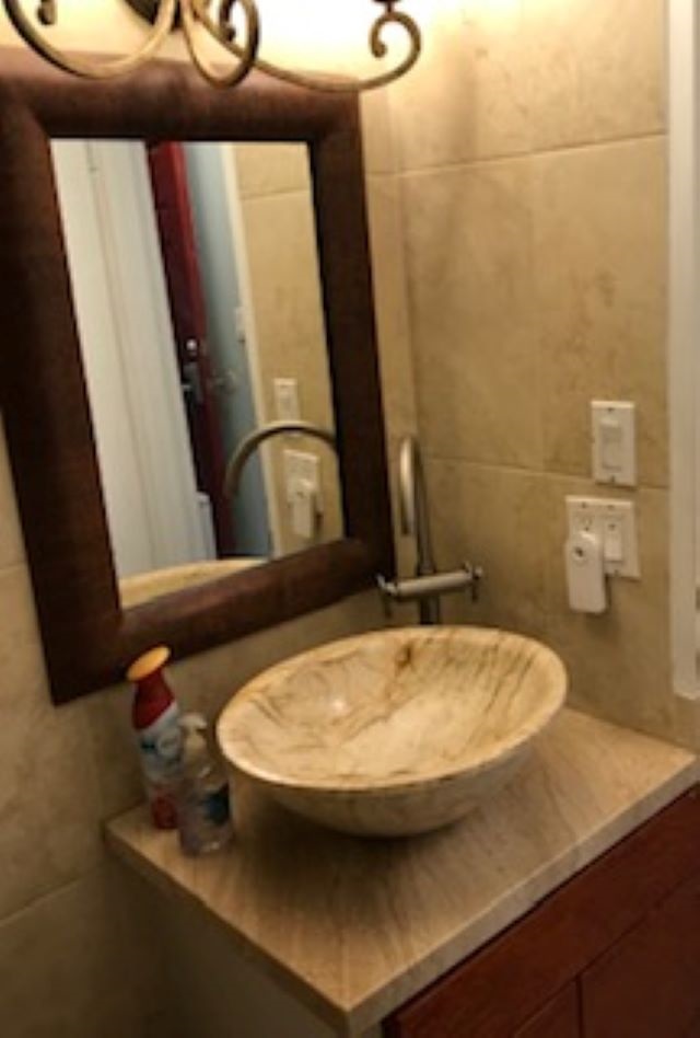 2037 South Kihei Road, Unit 1 Kihei, HI 96753 - Photo 9 of 16 a bathroom with a sink and a mirror