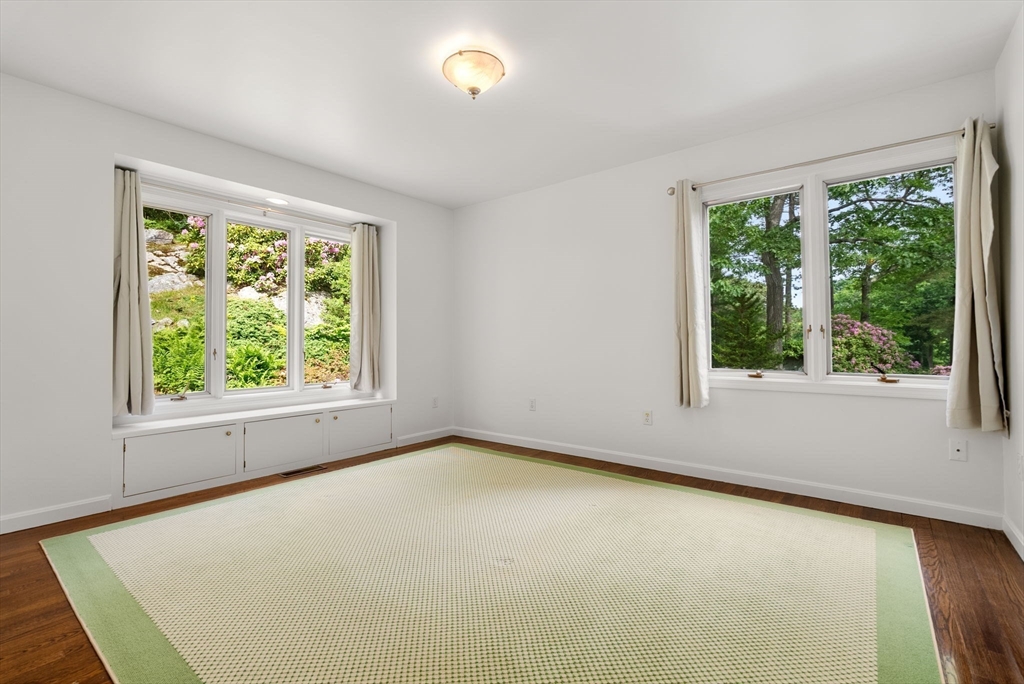 23 Ocean Street Manchester, MA 01944 - Photo 26 of 36 an empty room with large windows