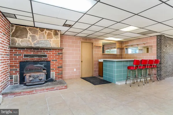 a view of livingroom with furniture and fireplace