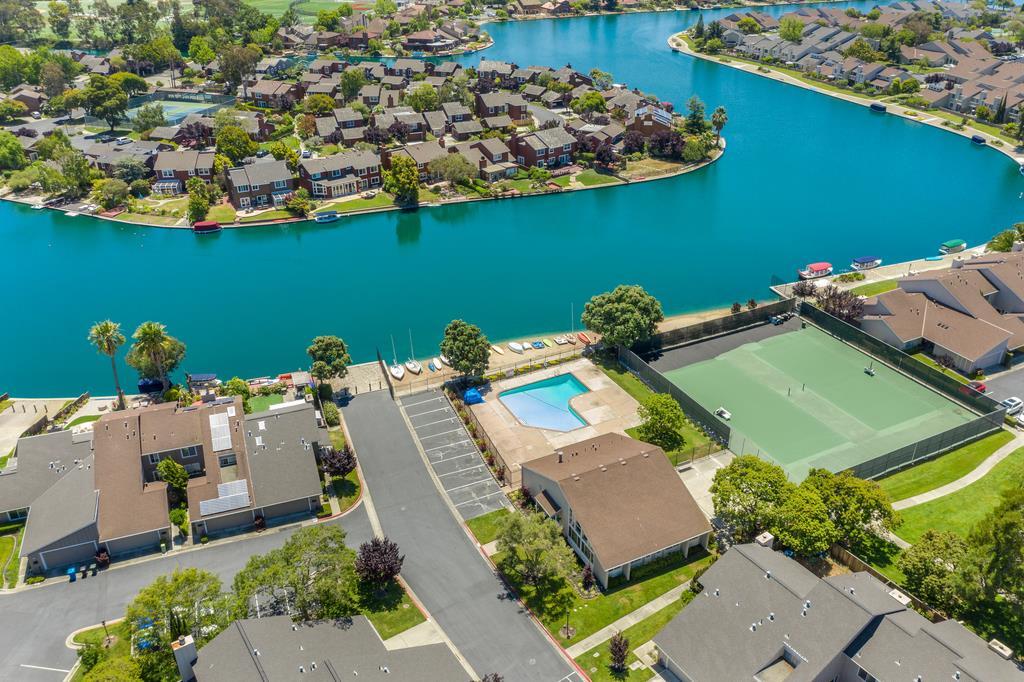 1091 Shell Boulevard, Unit 1 Foster City, CA 94404 - Photo 16 of 20 an aerial view of a house with a swimming pool a yard and a patio