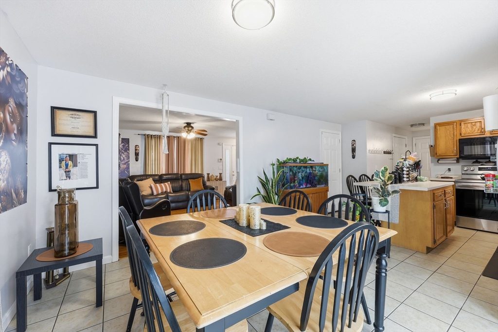 44 Border Street Springfield, MA 01104 - Photo 12 of 36 a view of a dining room with furniture