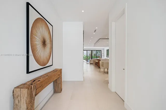 a view of living room and bathroom with furniture