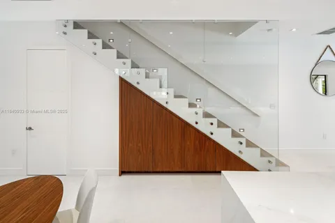 a view of entryway and kitchen