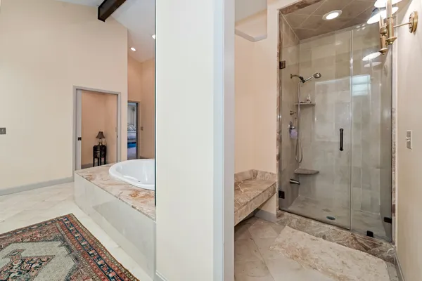 a bathroom with a sink and shower