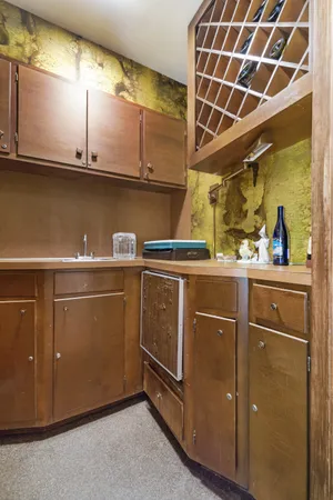 a utility room with cabinets