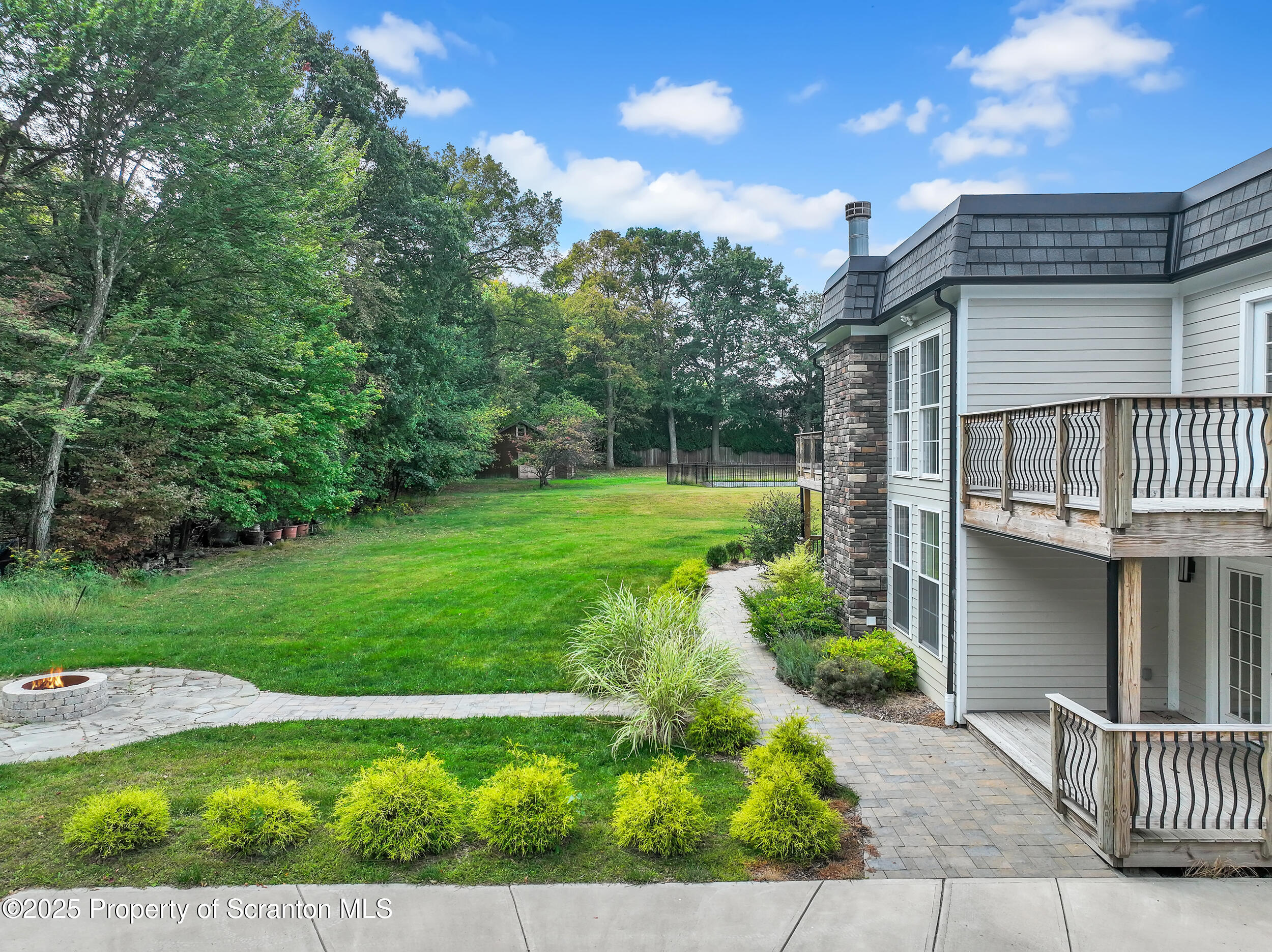 33 Fordham Road Wilkes Barre, PA 18702 - Photo 11 of 84 a view of a porch with a yard