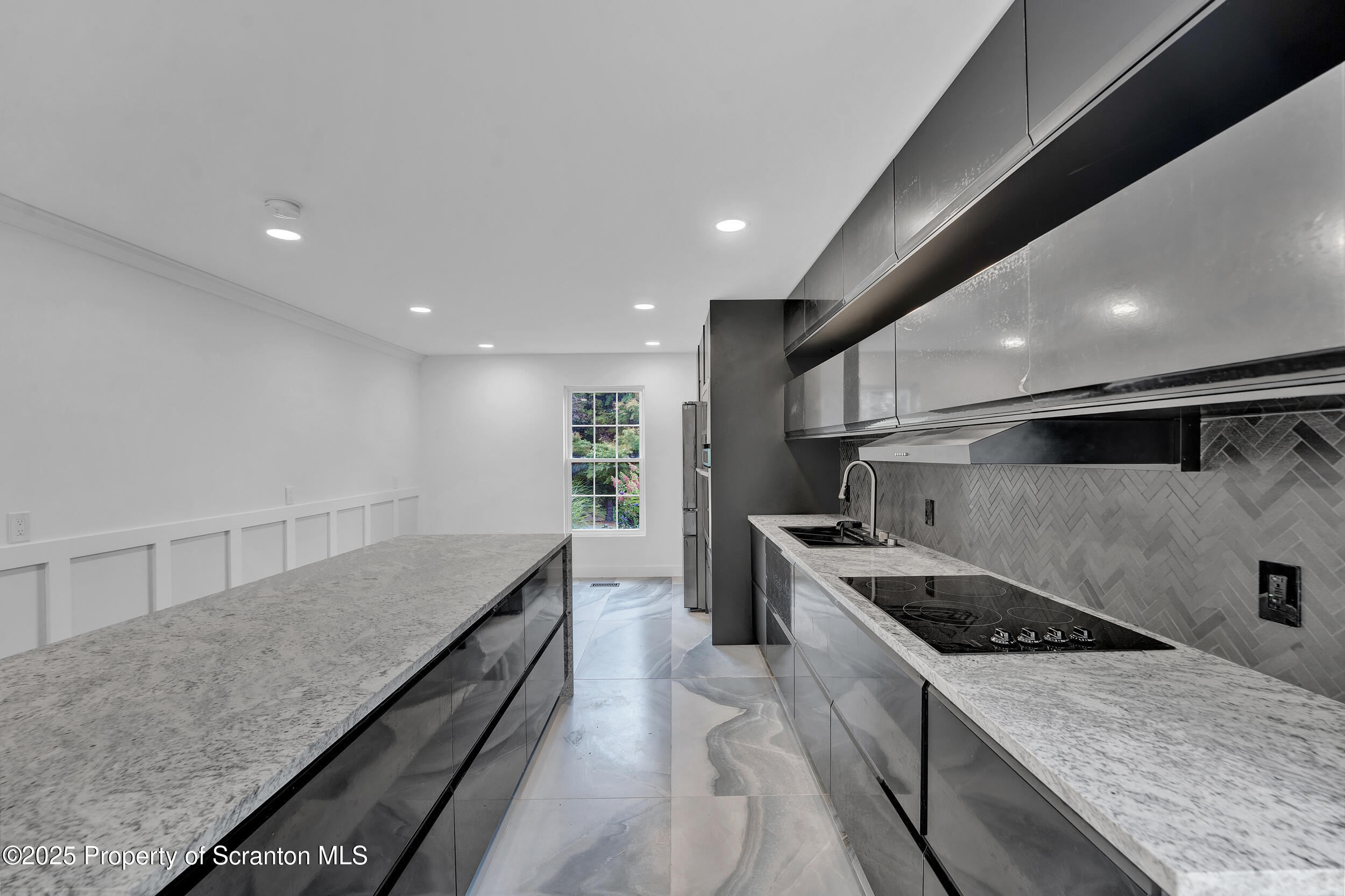 33 Fordham Road Wilkes Barre, PA 18702 - Photo 28 of 84 a kitchen with stainless steel appliances granite countertop a sink and a stove