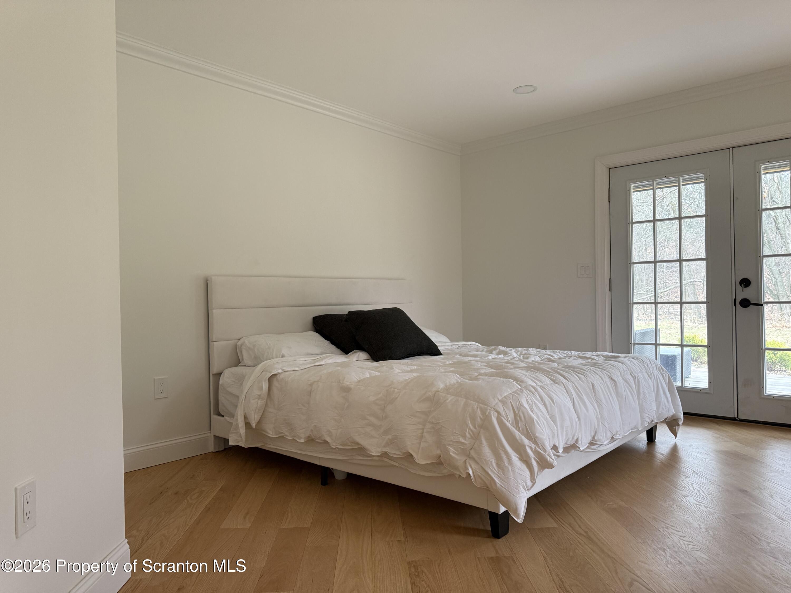 33 Fordham Road Wilkes Barre, PA 18702 - Photo 50 of 93 a large bed sitting in a bedroom next to a window