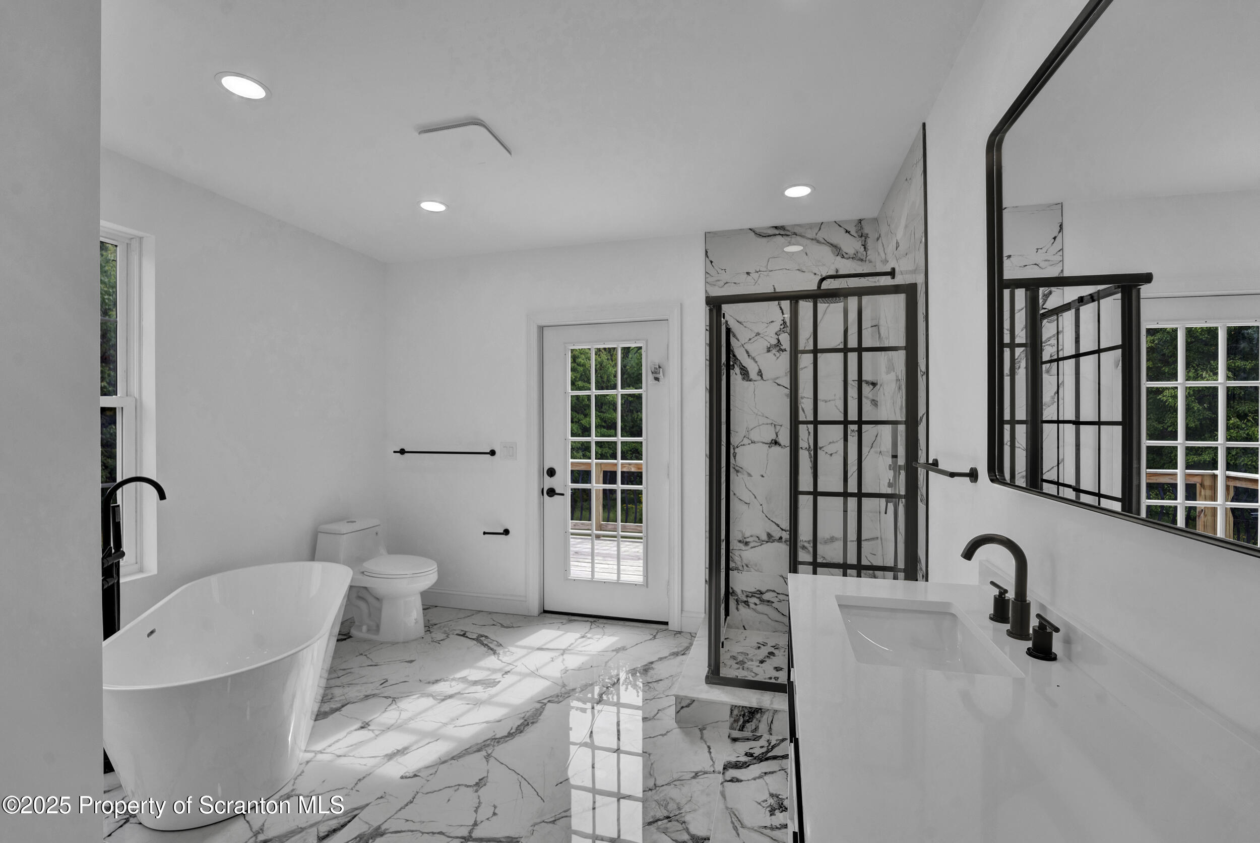 33 Fordham Road Wilkes Barre, PA 18702 - Photo 55 of 84 a bathroom with a toilet sink and shower