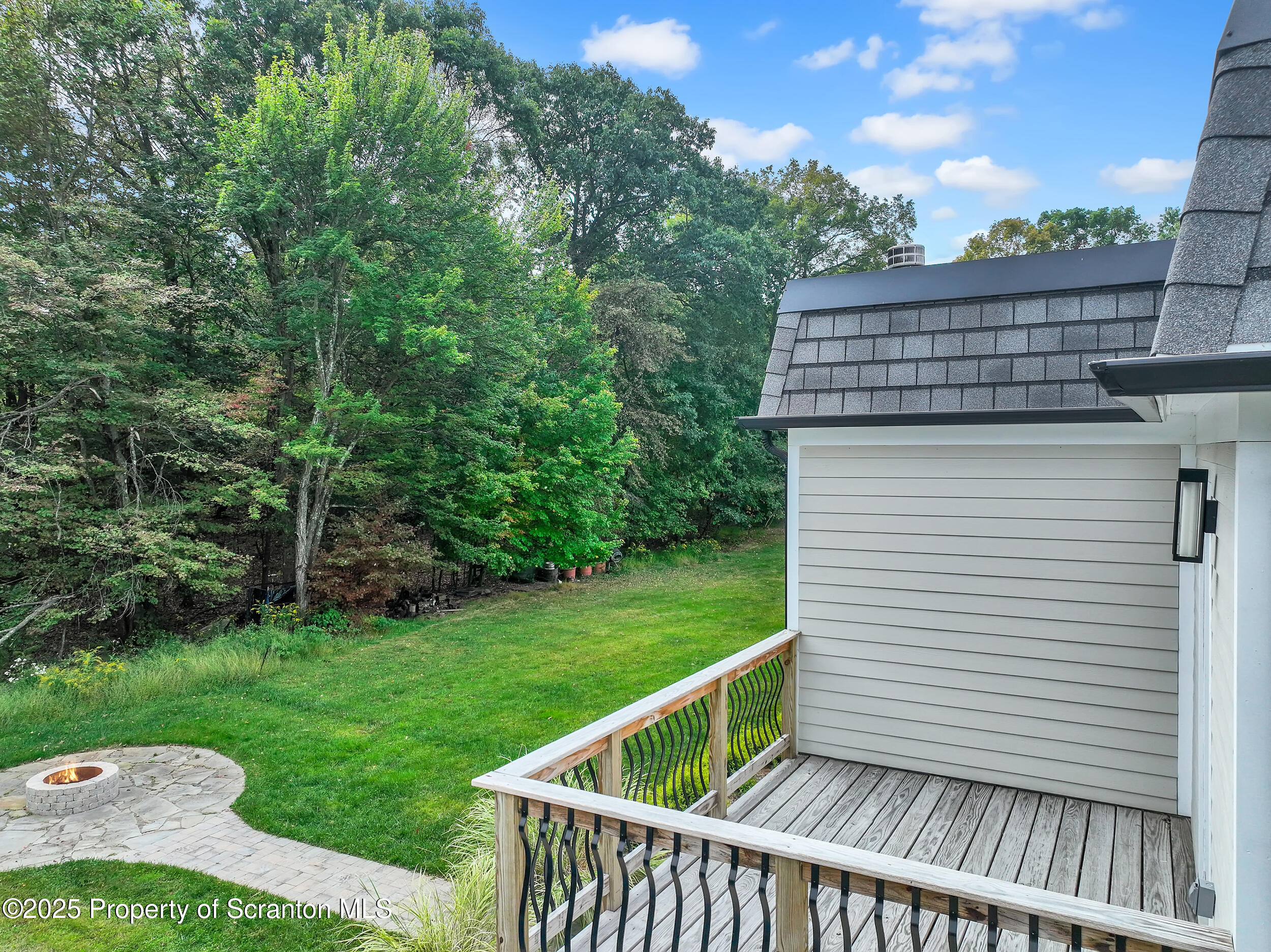 33 Fordham Road Wilkes Barre, PA 18702 - Photo 58 of 84 a view of a roof deck with wooden fence and plants