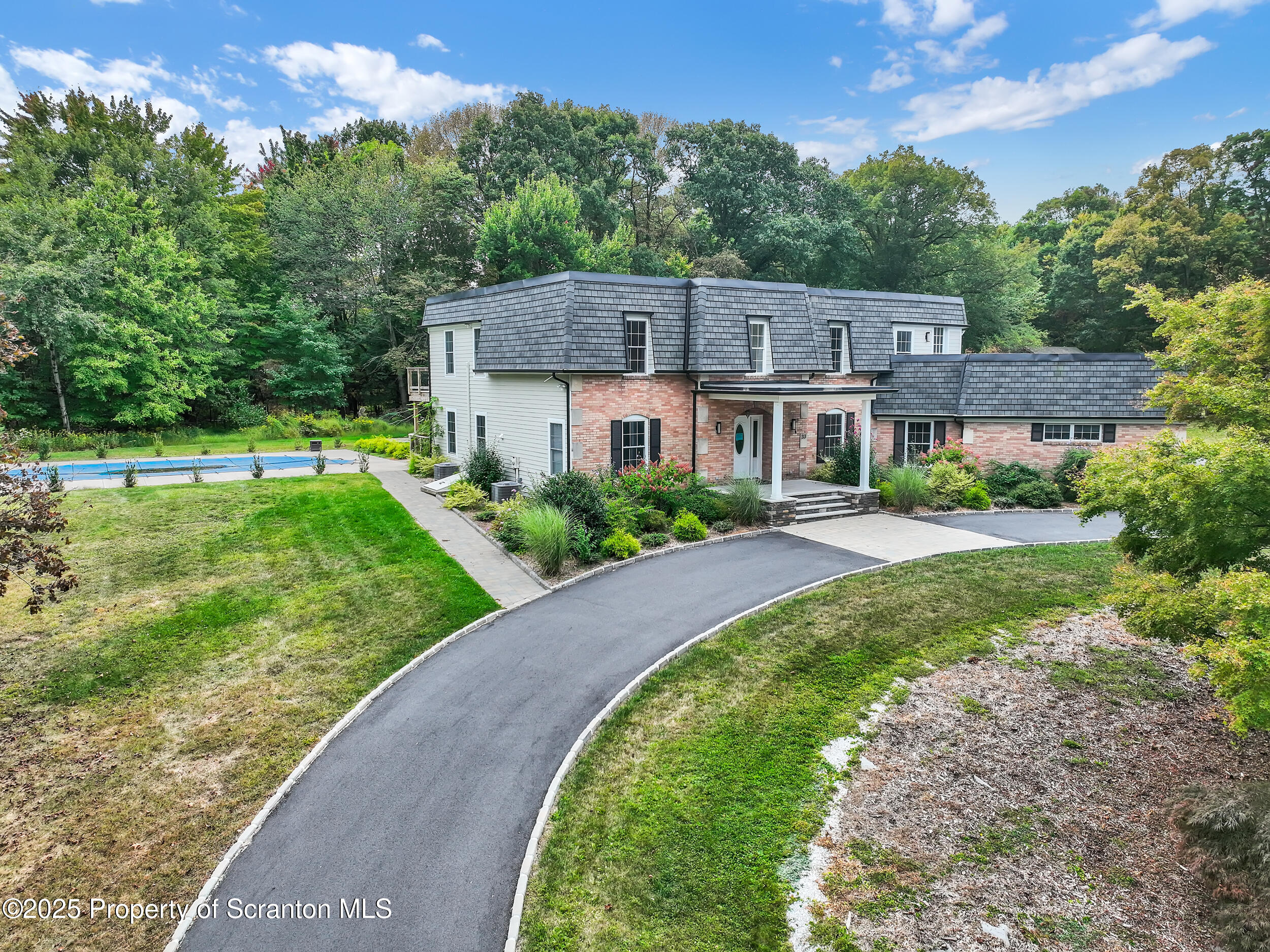 33 Fordham Road Wilkes Barre, PA 18702 - Photo 6 of 84 a front view of a house with a yard