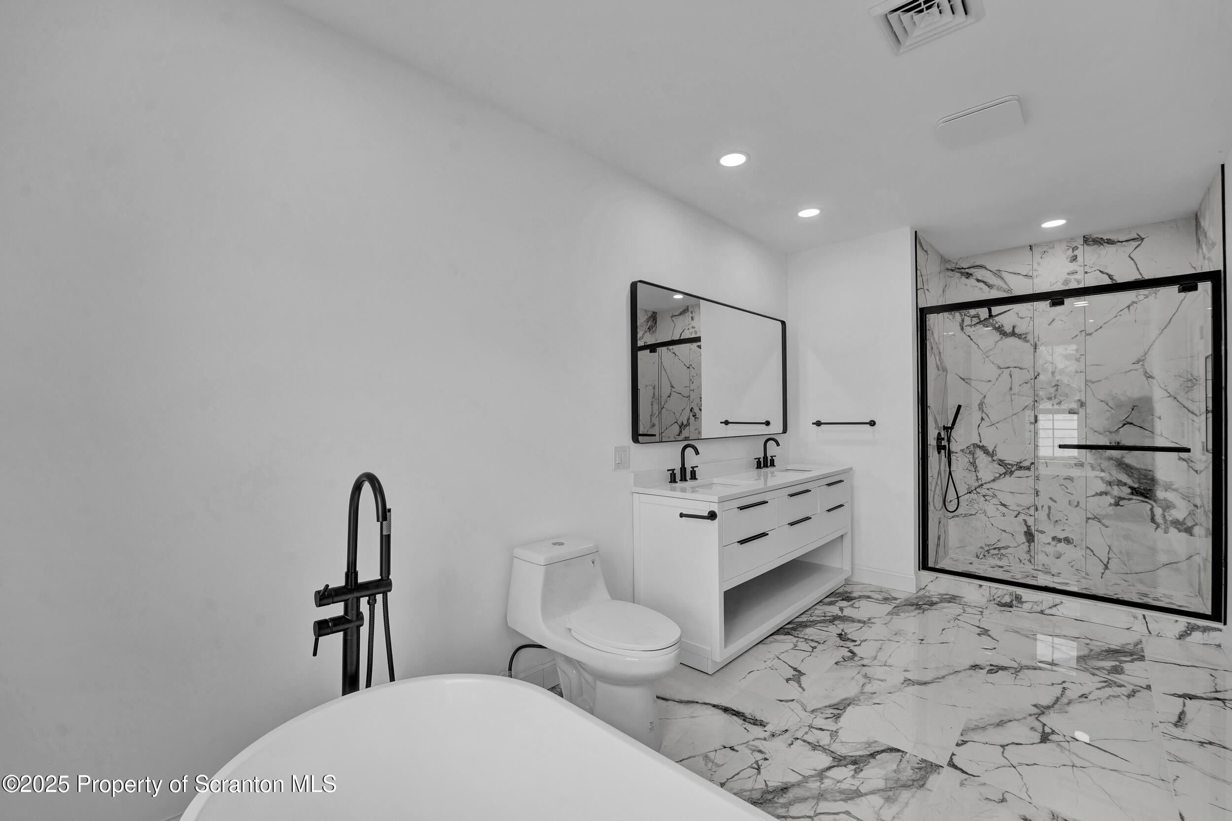 33 Fordham Road Wilkes Barre, PA 18702 - Photo 66 of 84 a bathroom with a toilet sink shower and mirror