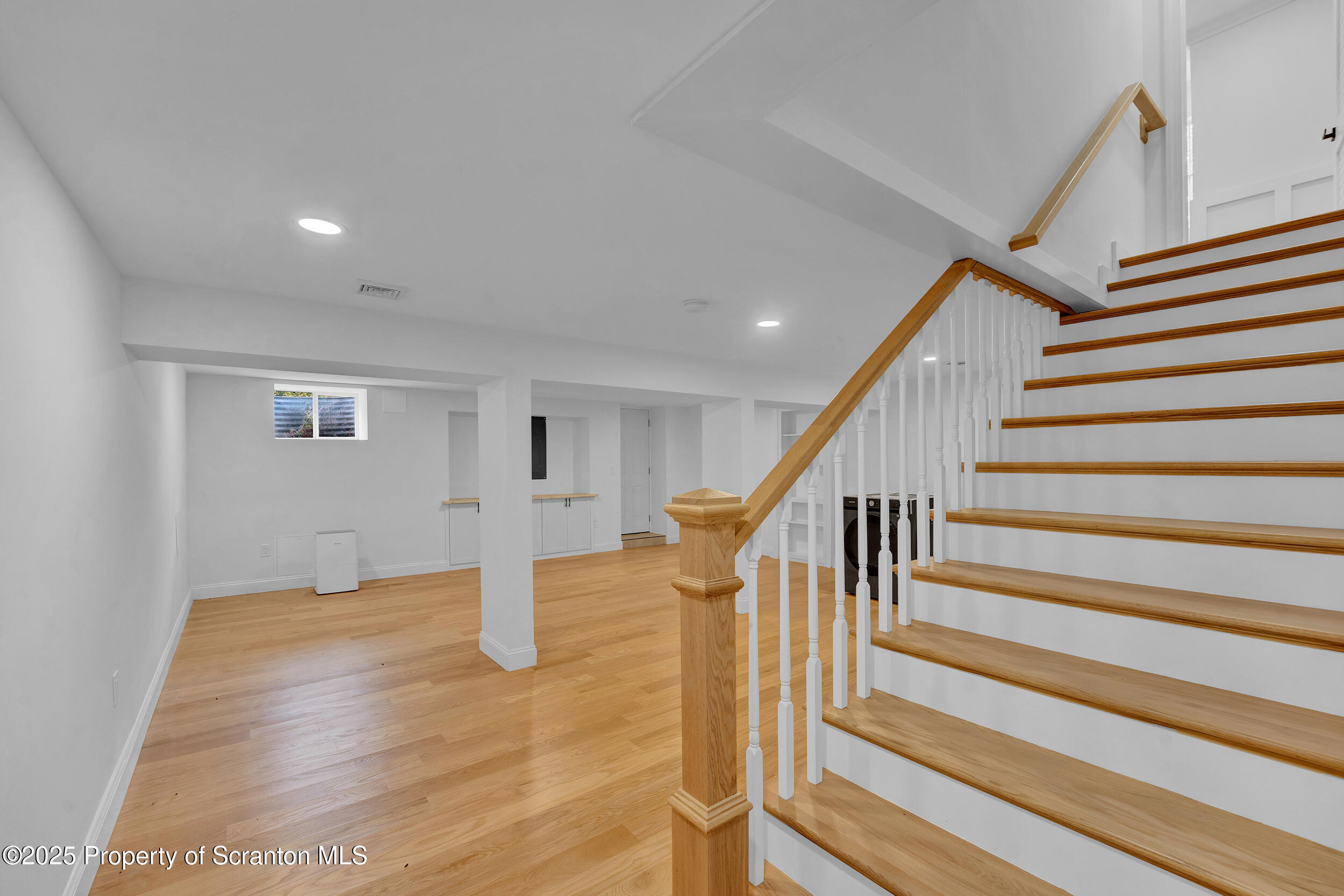 33 Fordham Road Wilkes Barre, PA 18702 - Photo 80 of 93 a view of staircase with lots of frames on stairs