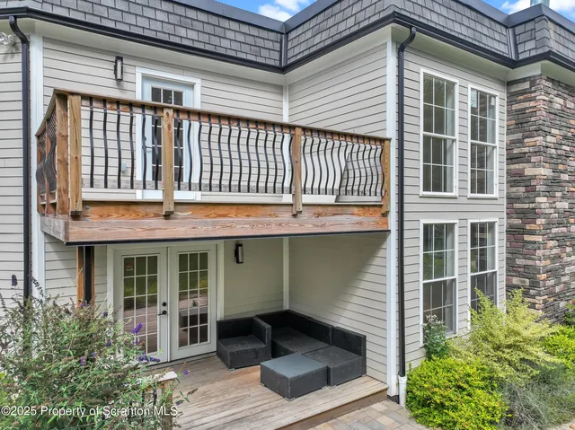 a view of a porch with a yard