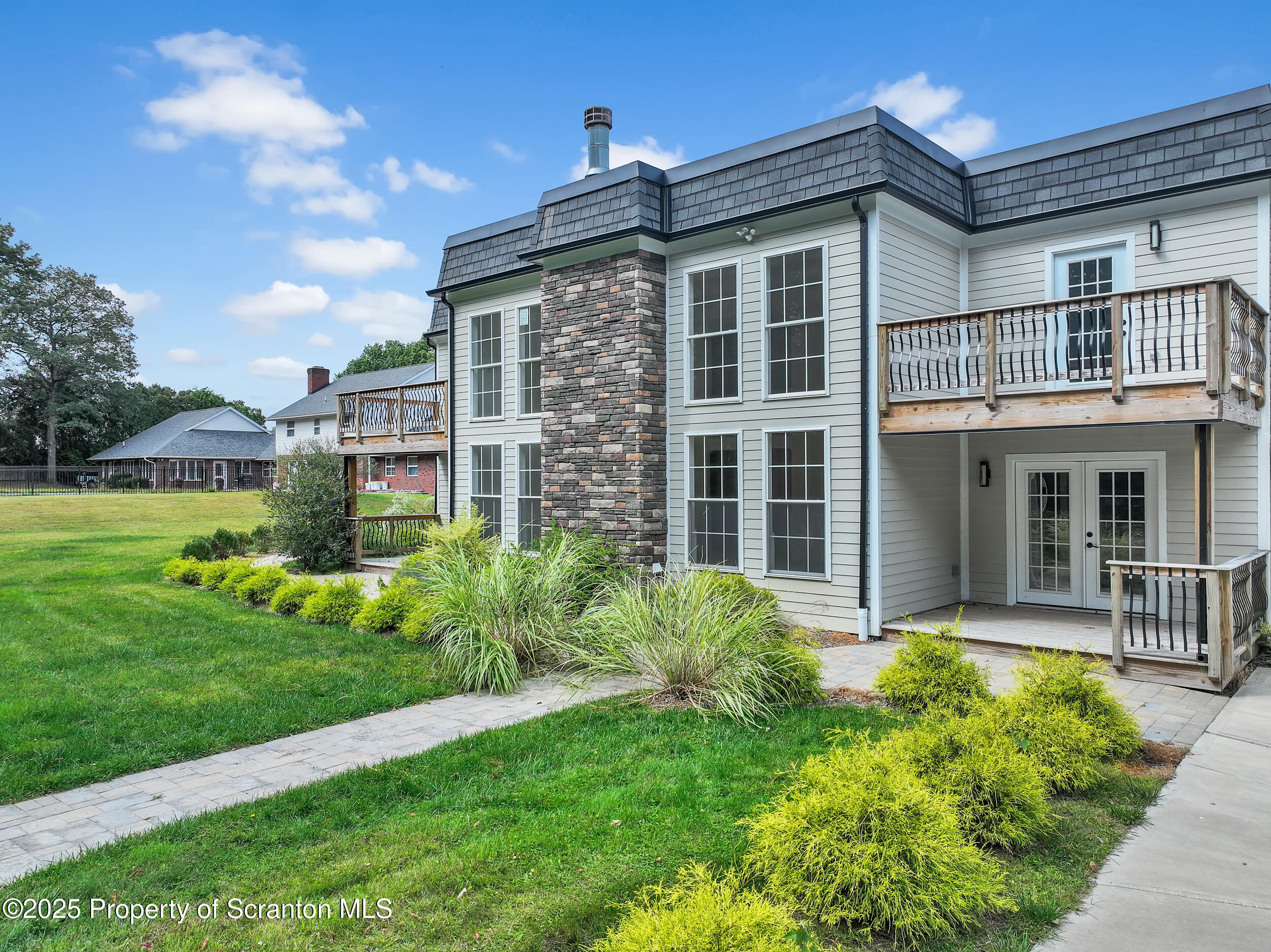 33 Fordham Road Wilkes Barre, PA 18702 - Photo 10 of 84 a front view of a house with garden