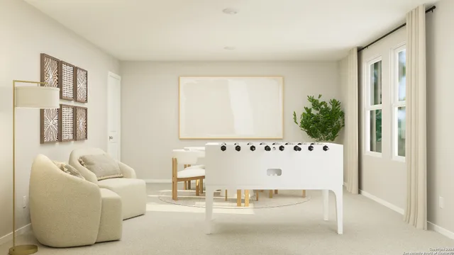 a living room with furniture and a table