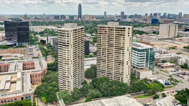 a view of a city with tall buildings