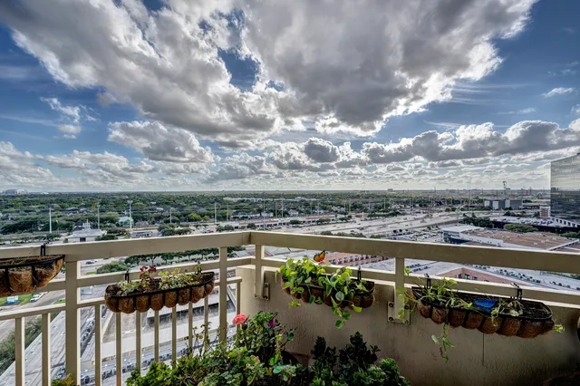 a view of a lake with a city