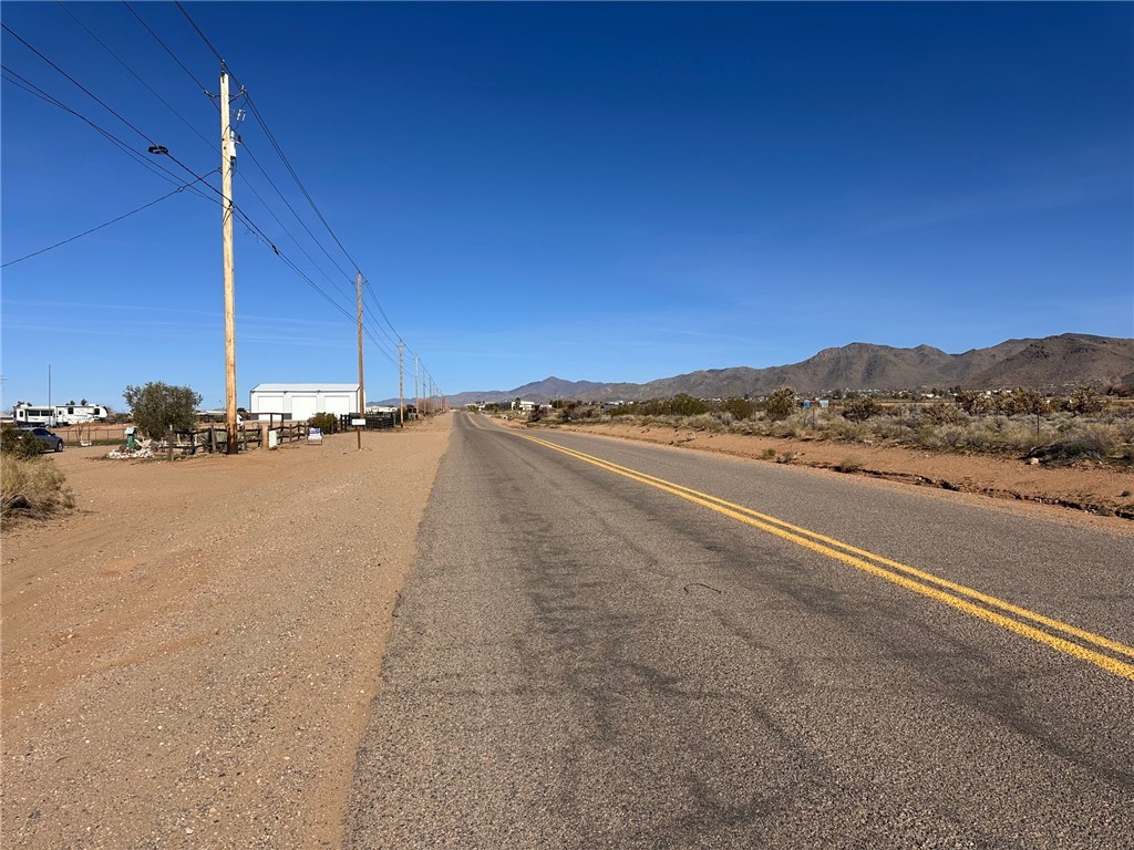 3309 Bacobi Road Golden Valley, AZ 86413 - Photo 4 of 31 View of asphalt street with a mountain view