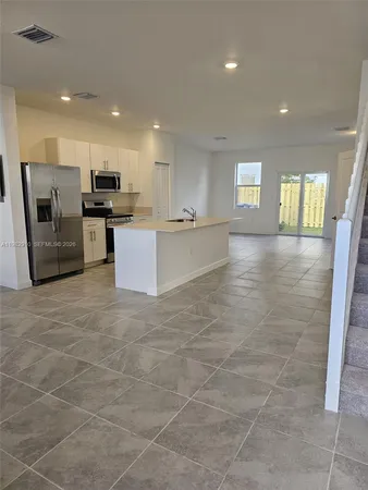 a view of kitchen with windows