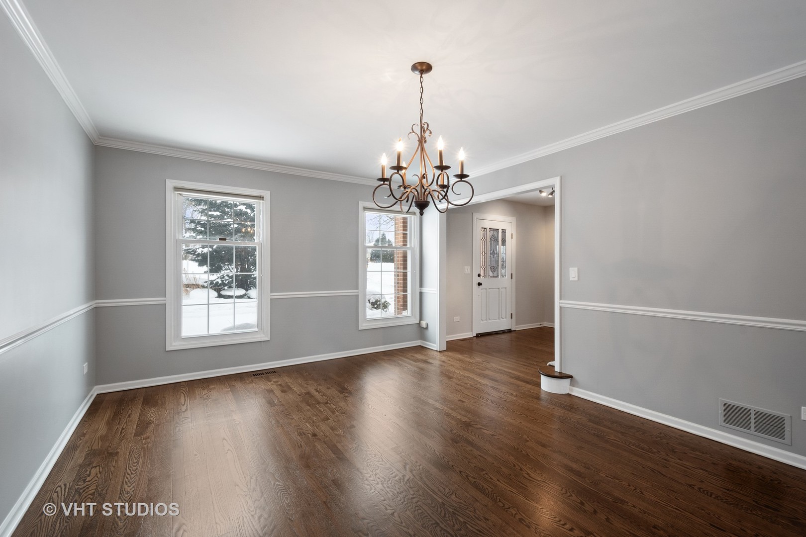 1406 Dunheath Drive Inverness, IL 60010 - Photo 11 of 27 an empty room with wooden floor and windows
