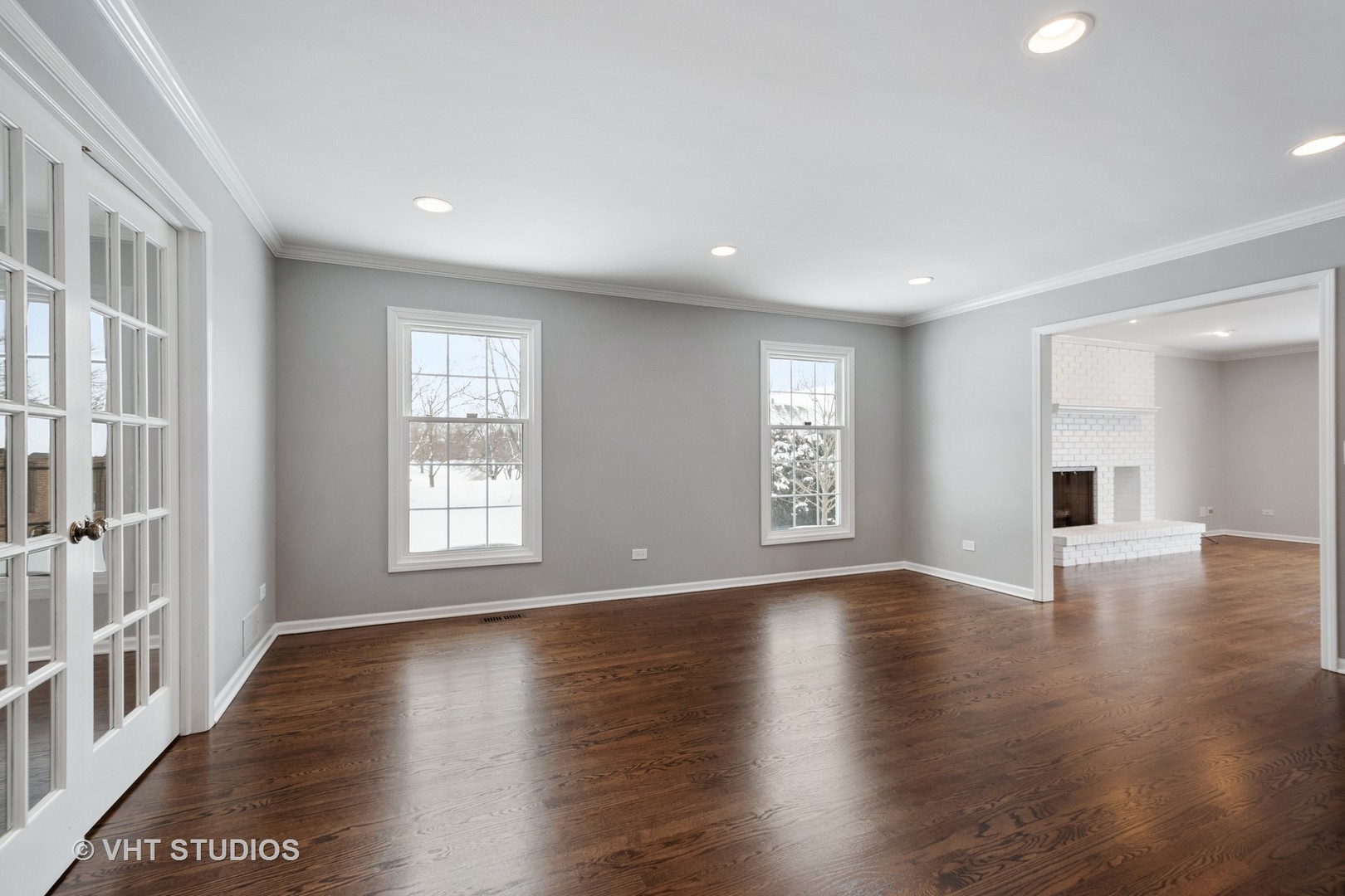1406 Dunheath Drive Inverness, IL 60010 - Photo 12 of 27 a view of an empty room with wooden floor and a window