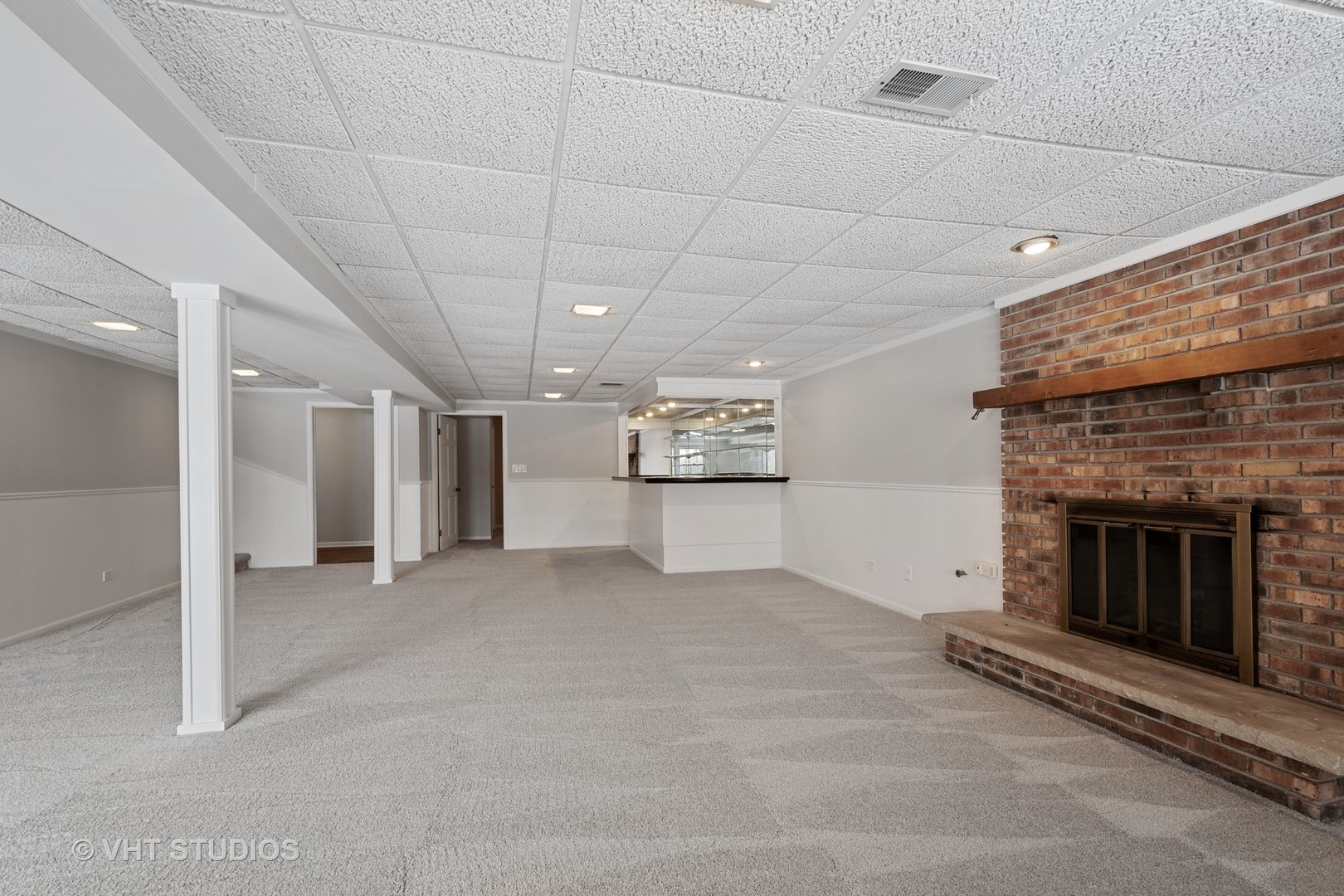 1406 Dunheath Drive Inverness, IL 60010 - Photo 20 of 27 a view of an empty room with a fireplace