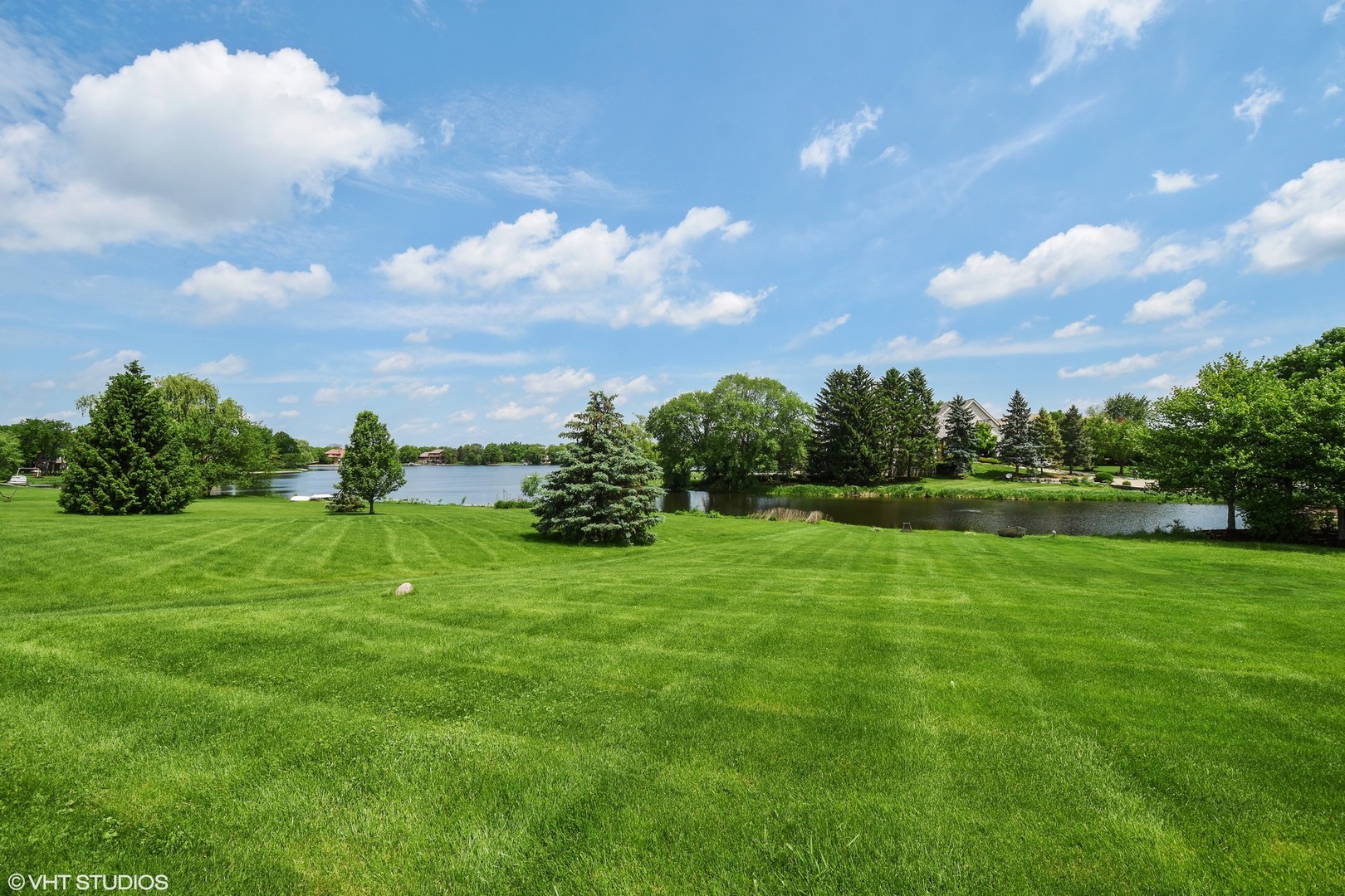 1406 Dunheath Drive Inverness, IL 60010 - Photo 23 of 27 a view of a golf course with a garden