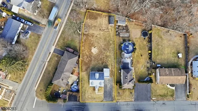 a view of road with large trees