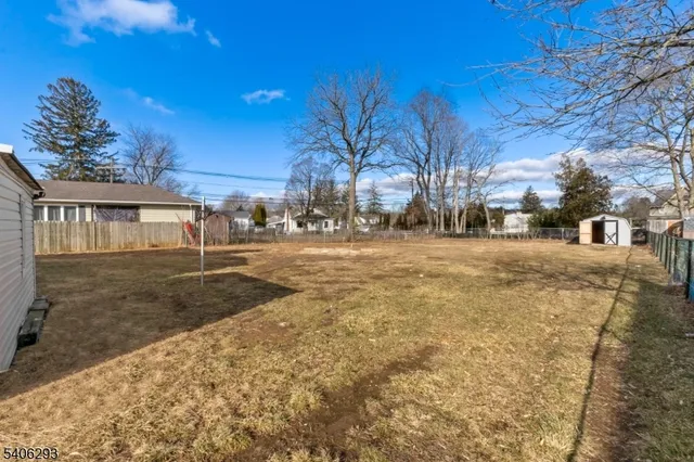 a view of a lake with a big yard