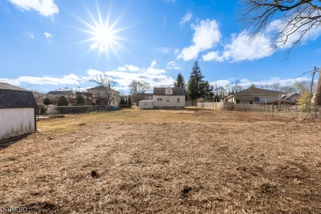 a view of road with large trees