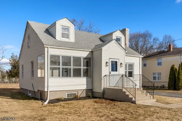 a front view of a house with a porch