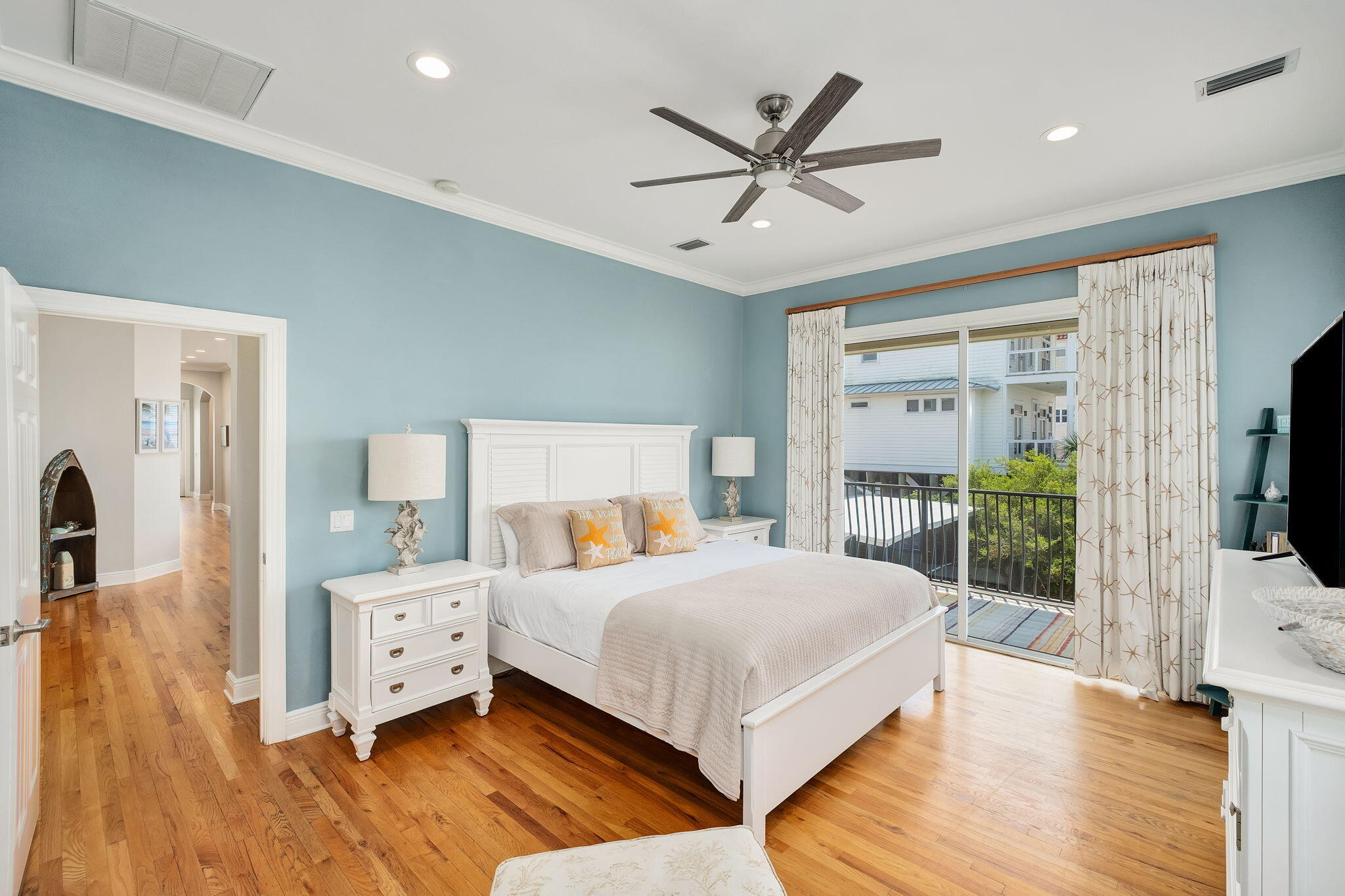 226 Sandtrap Road Miramar Beach, FL 32550 - Photo 12 of 15 a bedroom with a large bed and a flat tv screen on dresser